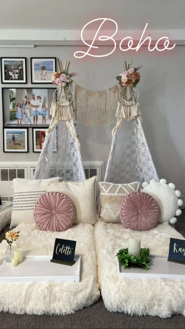 Two teepees with the word boho on them.