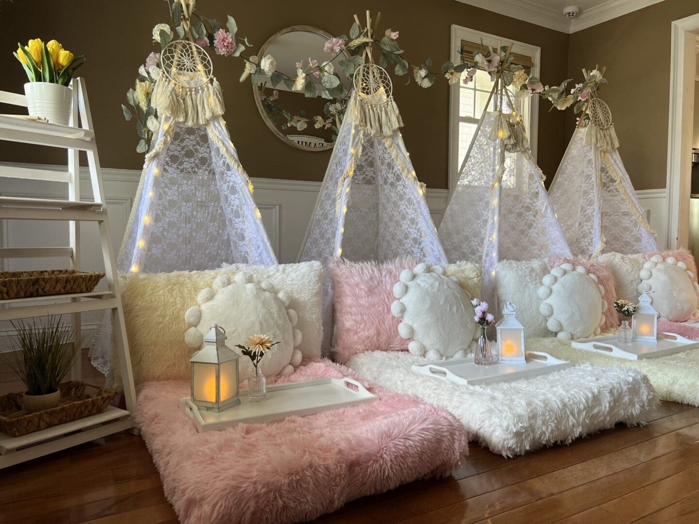 Pink and white teepees in a living room.