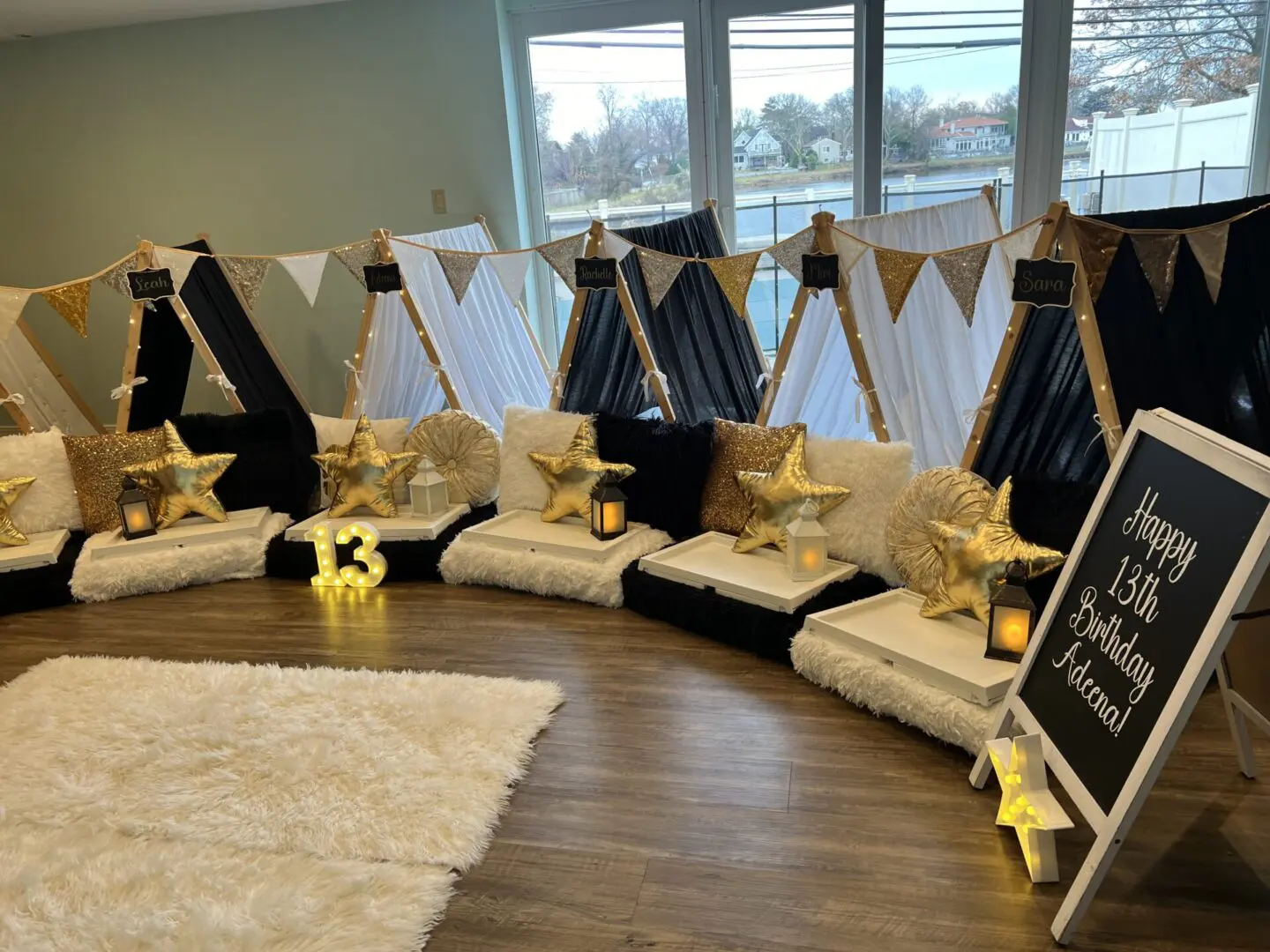 A room full of teepees and gold stars.